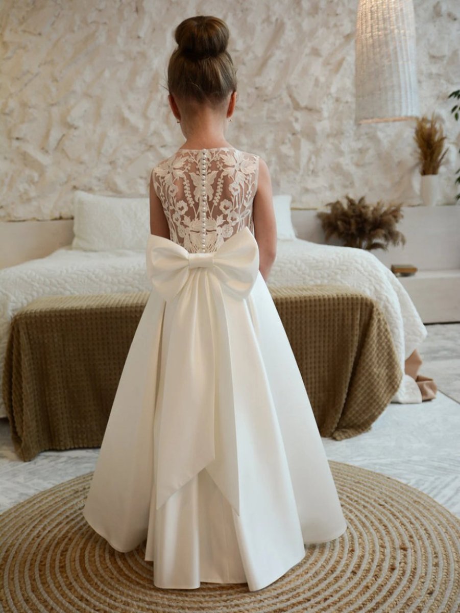 A-Line flower girl dress featuring delicate appliques and a pearl bow, designed in a sleeveless satin style, perfect for weddings and formal events. 1