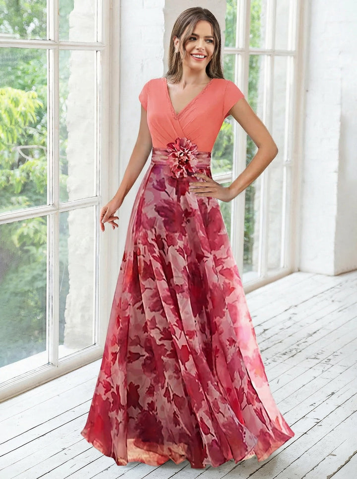 Elegant navy A-line mother of the bride dress featuring floral embellishments and a flattering V-neck design, perfect for special occasions. 11