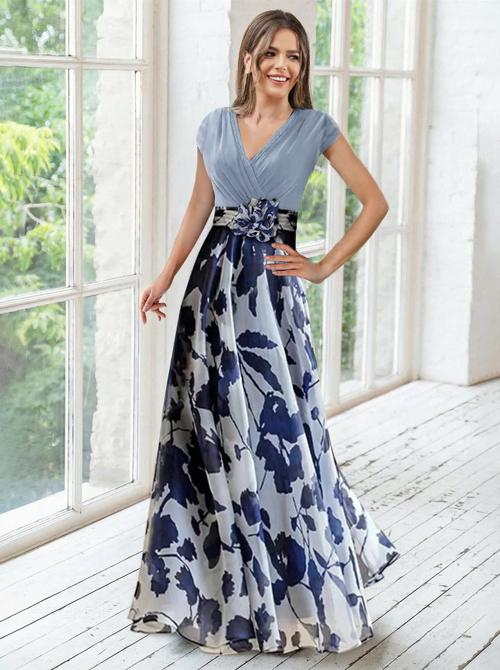 Elegant navy A-line mother of the bride dress featuring floral embellishments and a flattering V-neck design, perfect for special occasions. 8