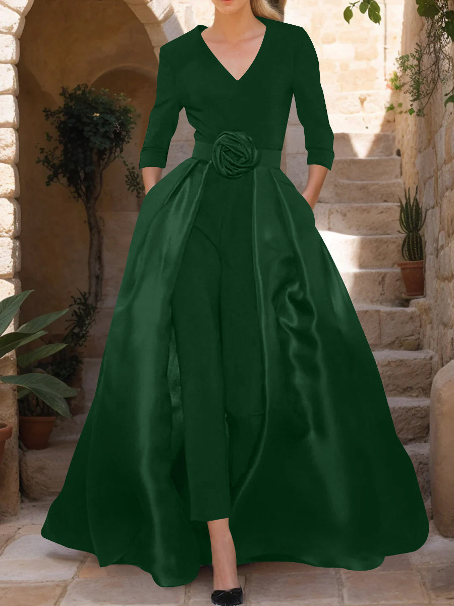 Elegant black jumpsuit for women featuring a flattering V-neck and stylish 3/4 sleeves, made from comfortable stretch fabric and designed with a beautiful flower 22