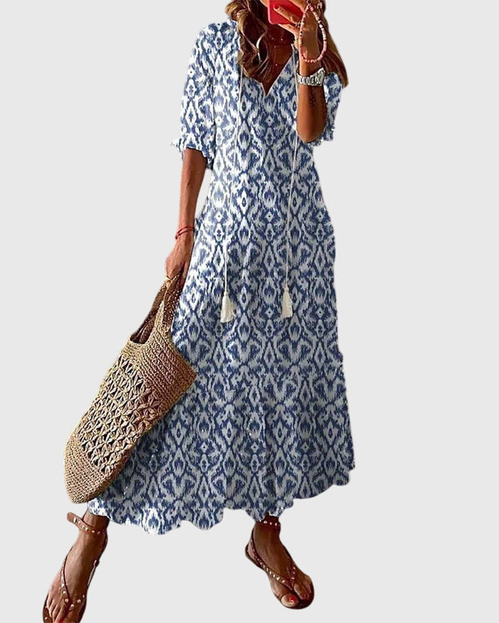 Boho vintage summer dress featuring a flattering V-neckline, lightweight fabric, and versatile design, perfect for casual outings and warm-weather events. 0