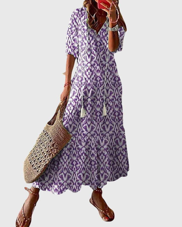 Boho vintage summer dress featuring a flattering V-neckline, lightweight fabric, and versatile design, perfect for casual outings and warm-weather events. 2