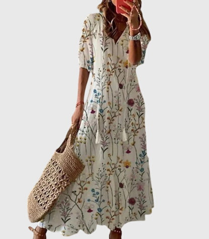 Boho vintage summer dress featuring a flattering V-neckline, lightweight fabric, and versatile design, perfect for casual outings and warm-weather events. 6