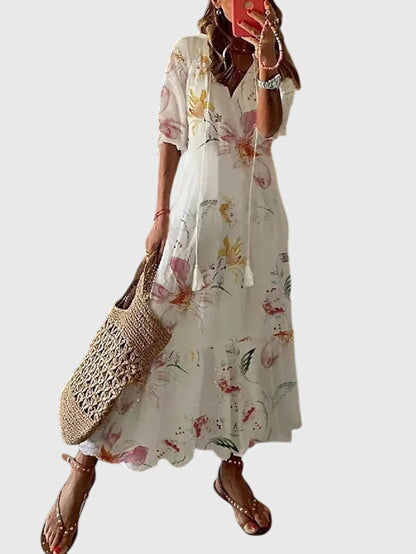 Boho vintage summer dress featuring a flattering V-neckline, lightweight fabric, and versatile design, perfect for casual outings and warm-weather events. 7