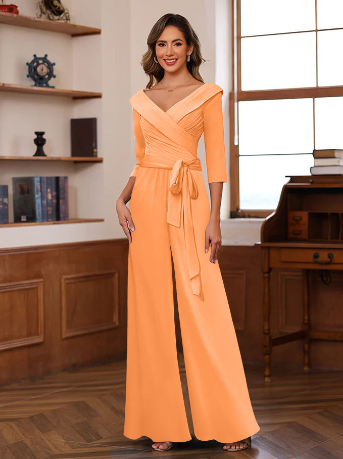Chiffon jumpsuit in dusty rose featuring ruched 3/4 sleeves and a flattering V-neck design, ankle-length perfect for stylish occasions. 25