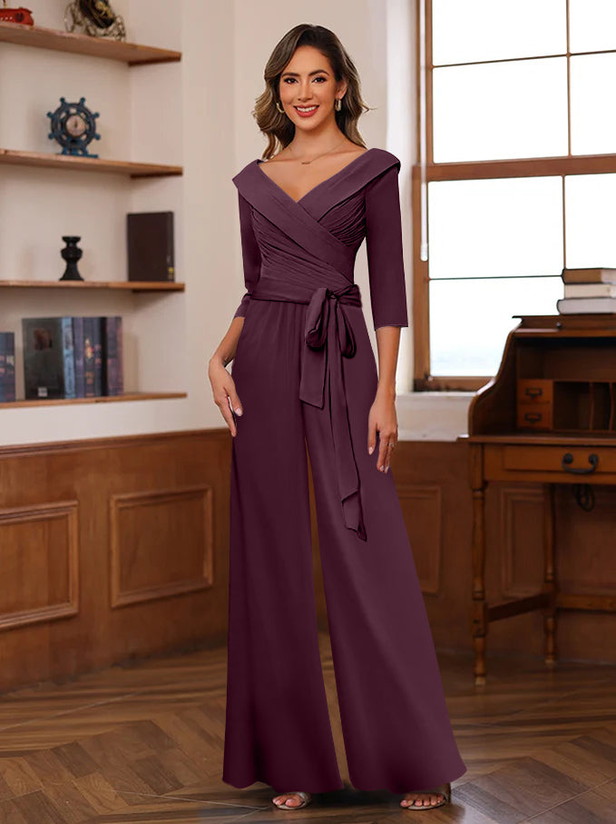 Chiffon jumpsuit in dusty rose featuring ruched 3/4 sleeves and a flattering V-neck design, ankle-length perfect for stylish occasions. 3