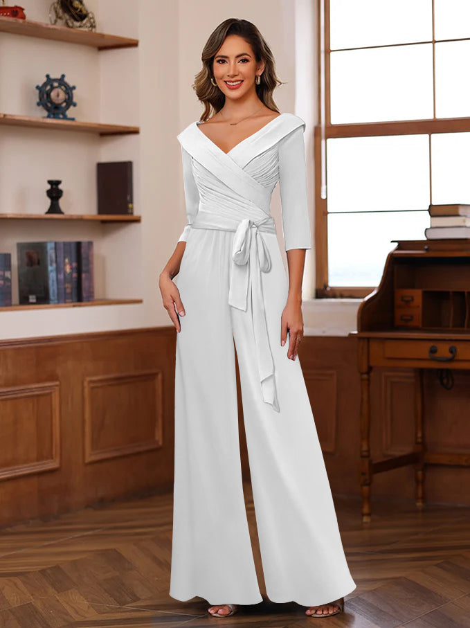 Chiffon jumpsuit in dusty rose featuring ruched 3/4 sleeves and a flattering V-neck design, ankle-length perfect for stylish occasions. 36