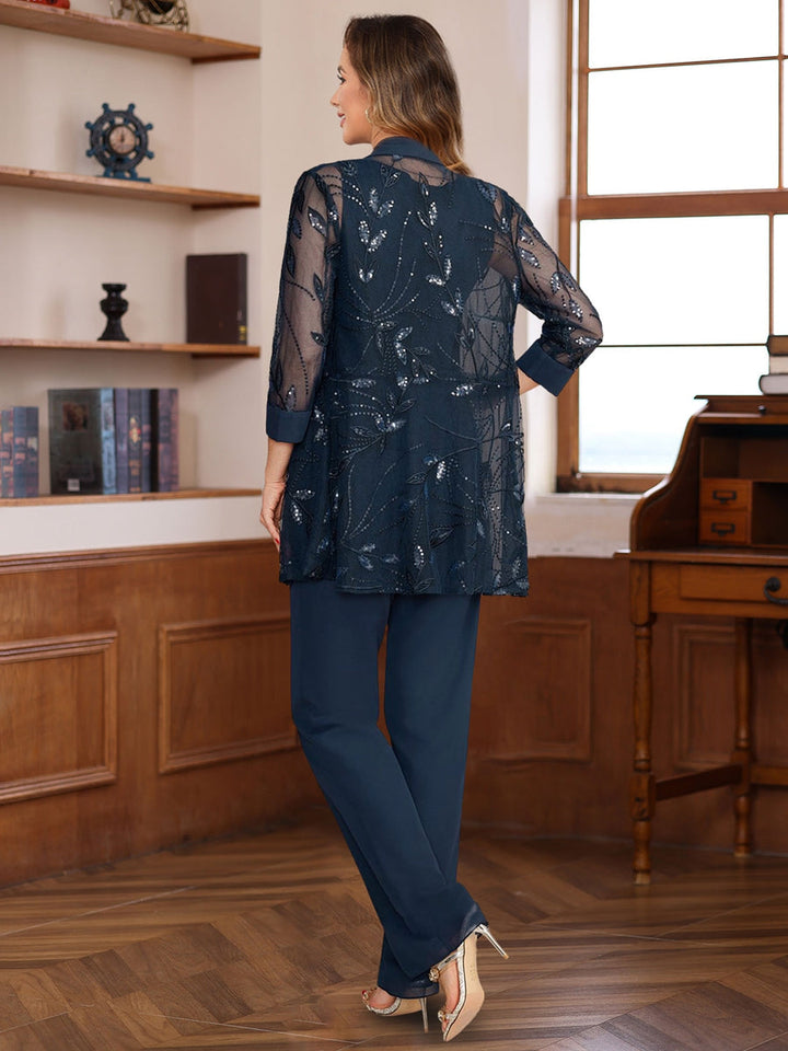 Chiffon floor-length pantsuit for mother of the bride in navy blue, featuring elegant lace and sequin details, designed with a sleeveless silhouette 1