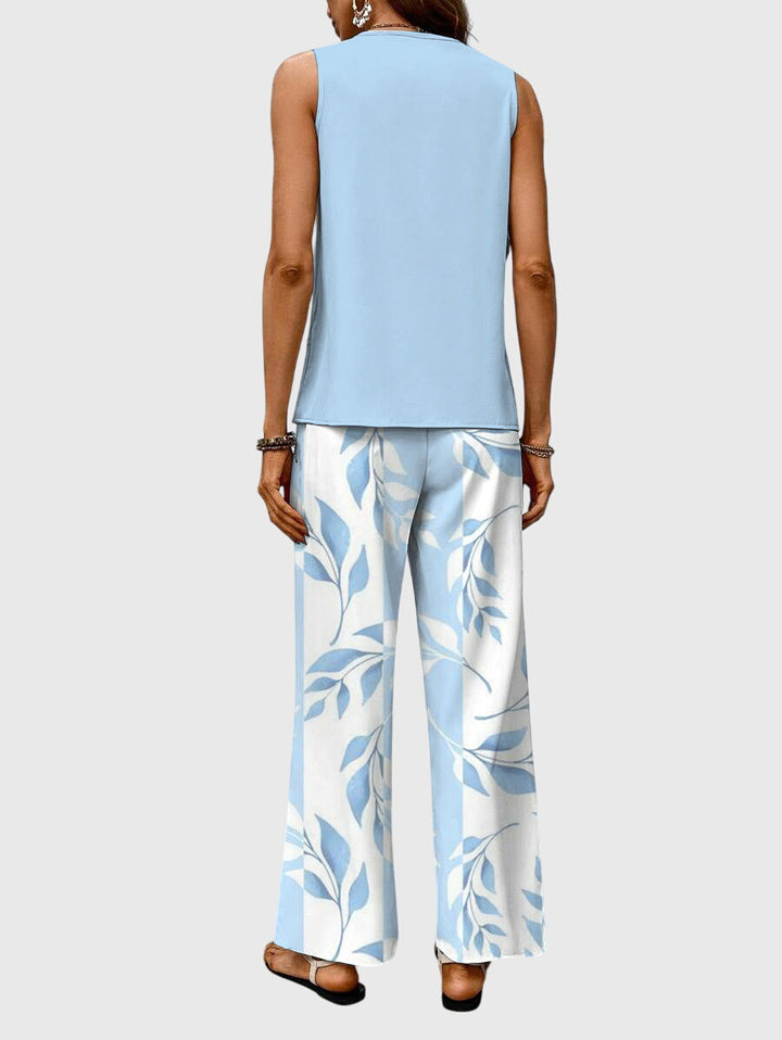 Elegant 2-piece summer set featuring a stylish square neckline and a vibrant blue plant print, perfect for warm weather outings. 2