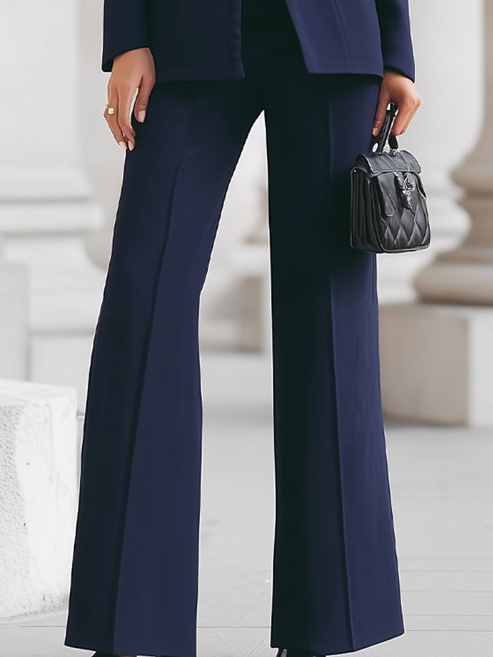 Elegant blazer and trouser suit set featuring a tailored fit and elongated silhouette, perfect for professional and formal occasions. 6