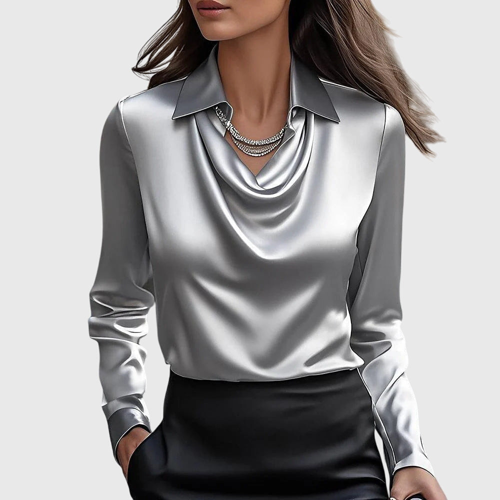 Elegant blouse featuring flattering draping and a comfortable fit for women, ideal for versatile styling on any occasion. 1