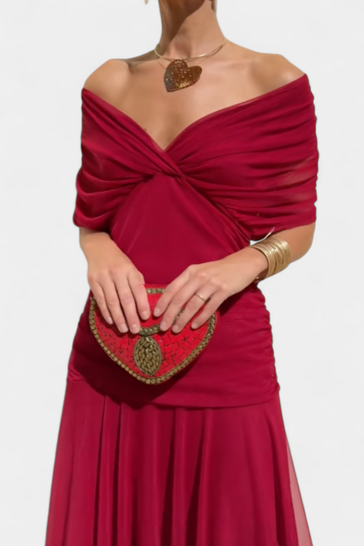 Elegant floral dress featuring a flattering V-neckline, pleated waist, and a long flowing skirt, perfect for any special occasion. 11