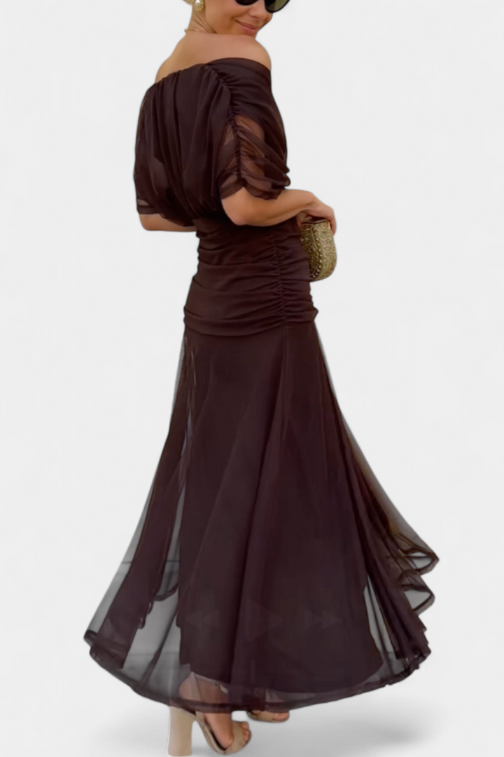Elegant floral dress featuring a flattering V-neckline, pleated waist, and a long flowing skirt, perfect for any special occasion. 2
