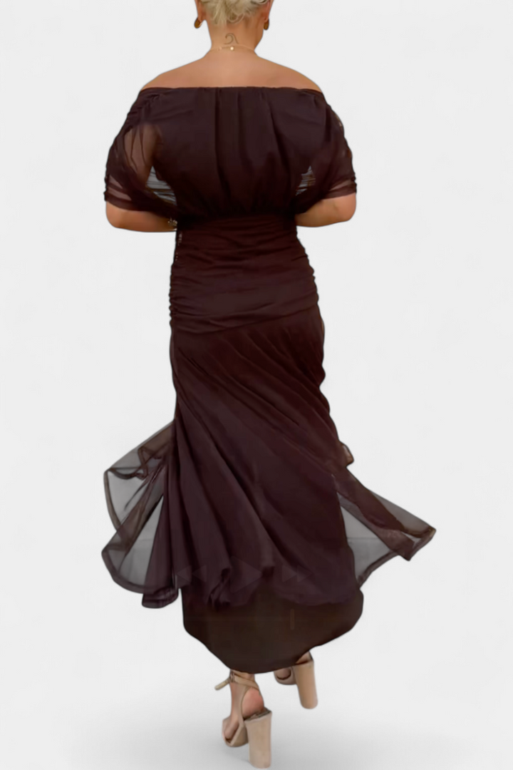 Elegant floral dress featuring a flattering V-neckline, pleated waist, and a long flowing skirt, perfect for any special occasion. 3