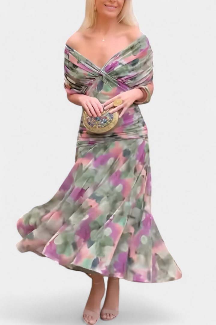 Elegant floral dress featuring a flattering V-neckline, pleated waist, and a long flowing skirt, perfect for any special occasion. 4