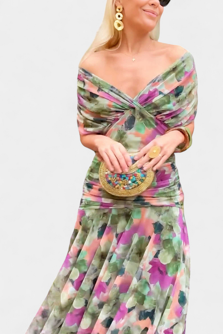 Elegant floral dress featuring a flattering V-neckline, pleated waist, and a long flowing skirt, perfect for any special occasion. 5
