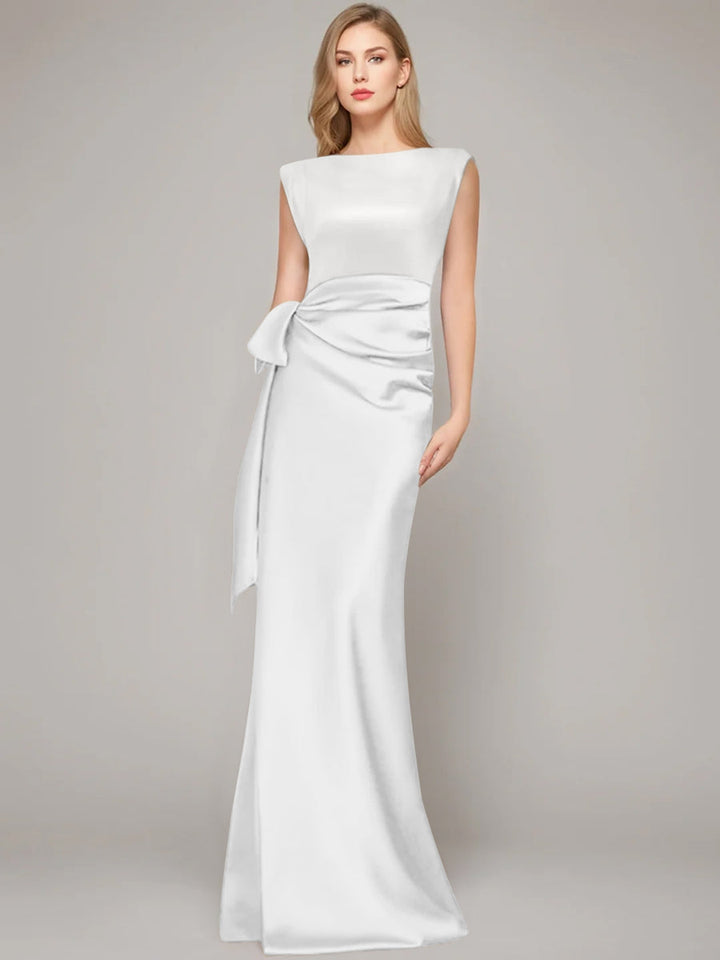 Elegant floor-length champagne satin sheath dress for the mother of the bride, featuring a stylish bow and shoulder pads for a sophisticated look. 10