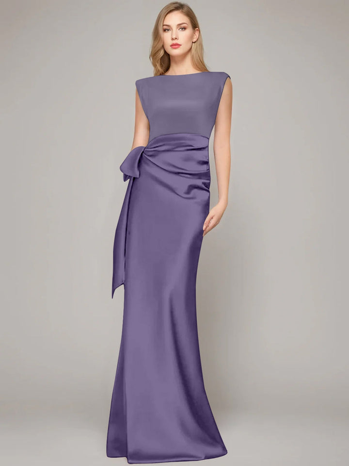 Elegant floor-length champagne satin sheath dress for the mother of the bride, featuring a stylish bow and shoulder pads for a sophisticated look. 11