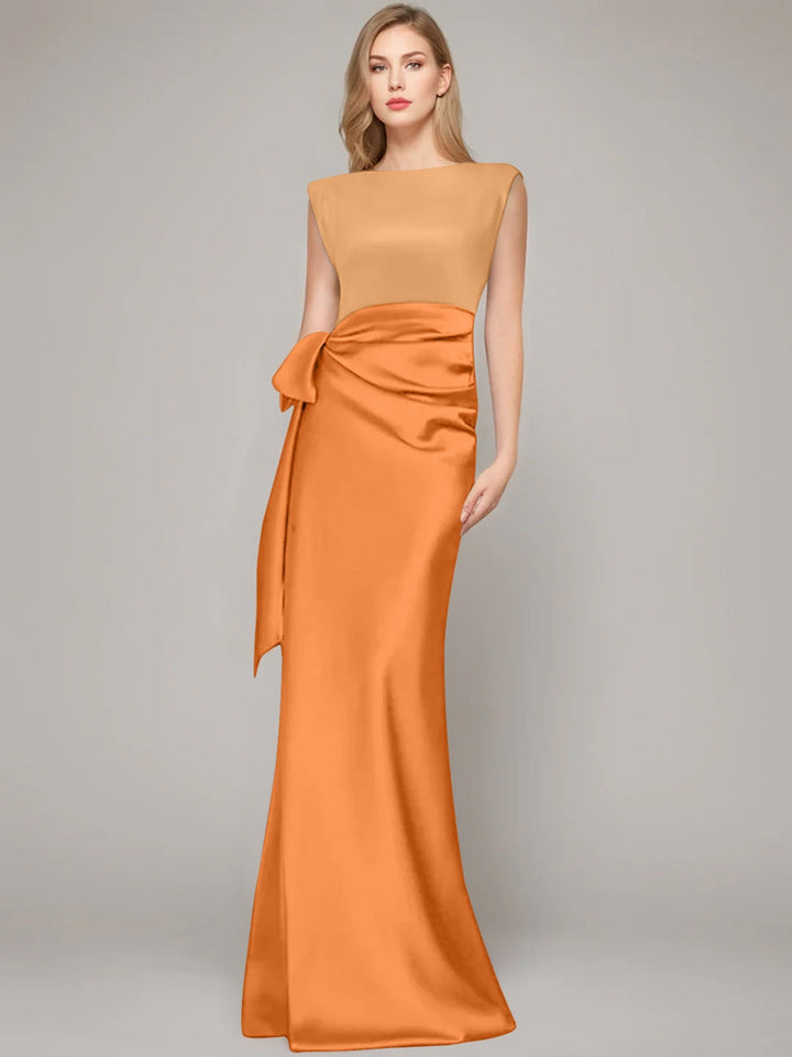 Elegant floor-length champagne satin sheath dress for the mother of the bride, featuring a stylish bow and shoulder pads for a sophisticated look. 15