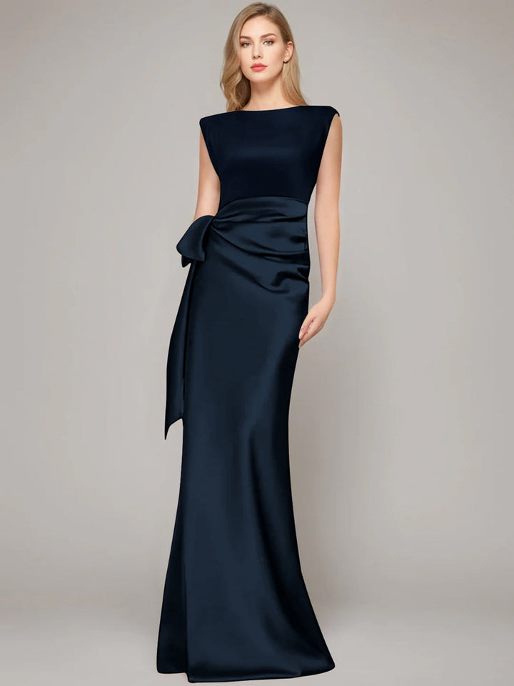 Elegant floor-length champagne satin sheath dress for the mother of the bride, featuring a stylish bow and shoulder pads for a sophisticated look. 16