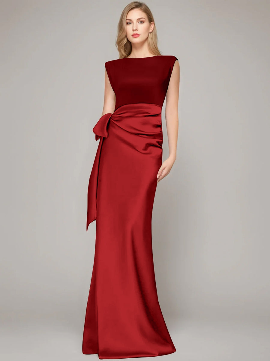 Elegant floor-length champagne satin sheath dress for the mother of the bride, featuring a stylish bow and shoulder pads for a sophisticated look. 19