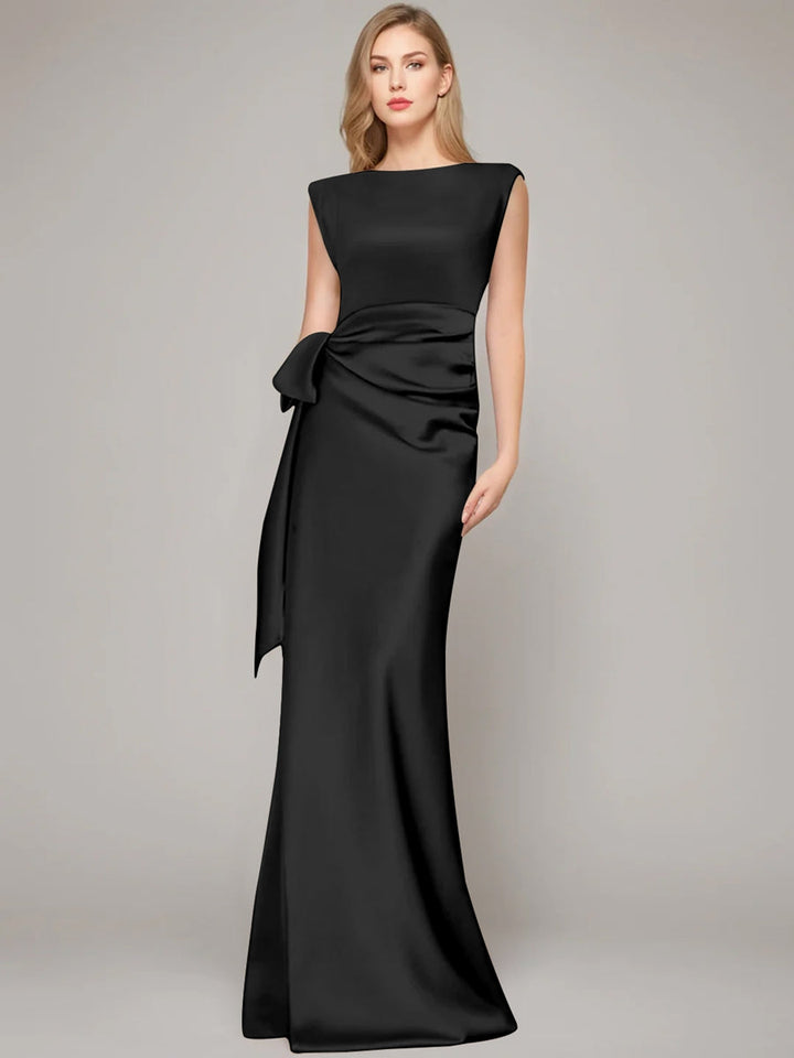 Elegant floor-length champagne satin sheath dress for the mother of the bride, featuring a stylish bow and shoulder pads for a sophisticated look. 2