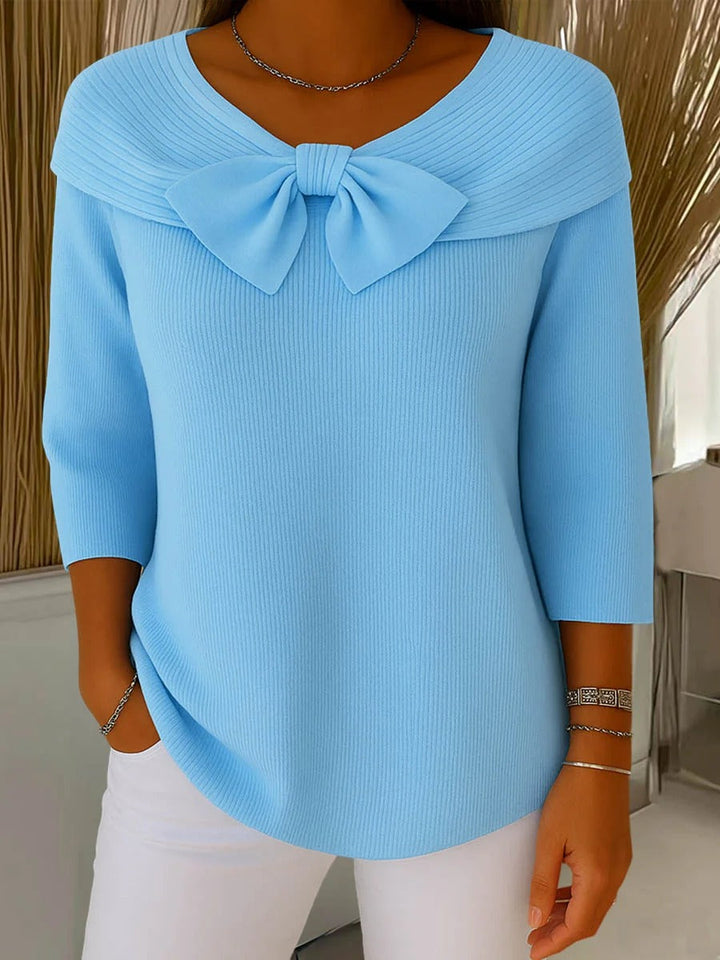 Elegant sweater featuring a romantic bow detail, crafted from soft fabric for a versatile and stylish look, perfect for any occasion. 0