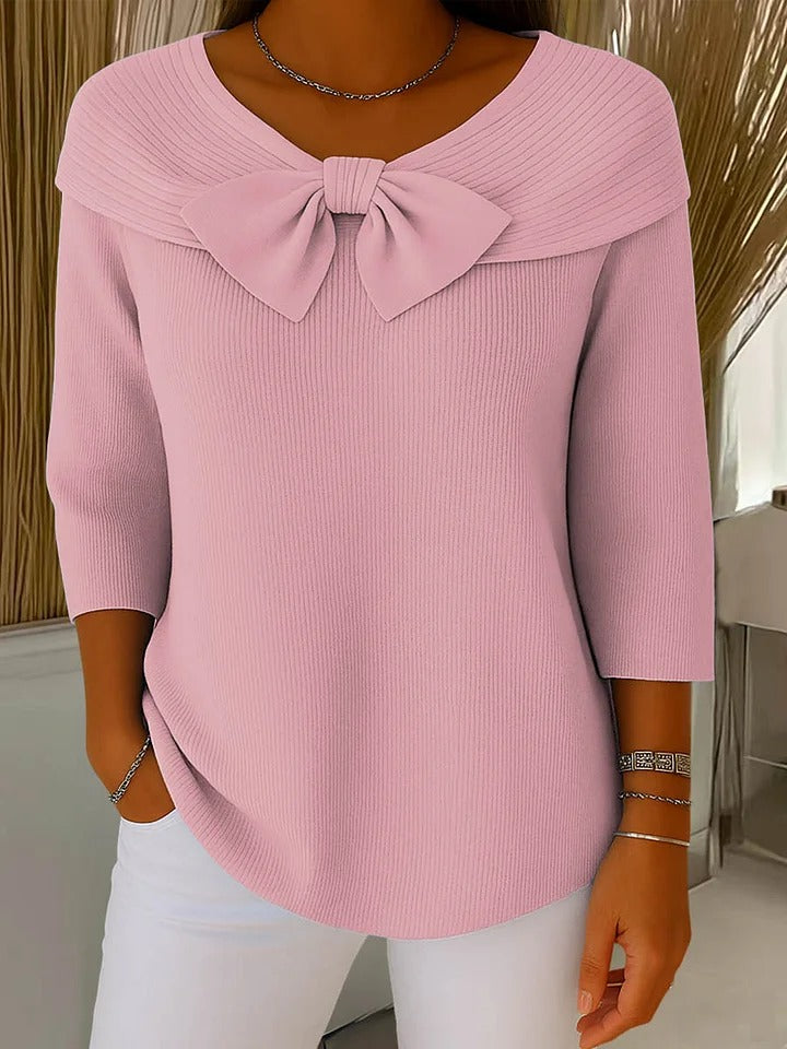 Elegant sweater featuring a romantic bow detail, crafted from soft fabric for a versatile and stylish look, perfect for any occasion. 1