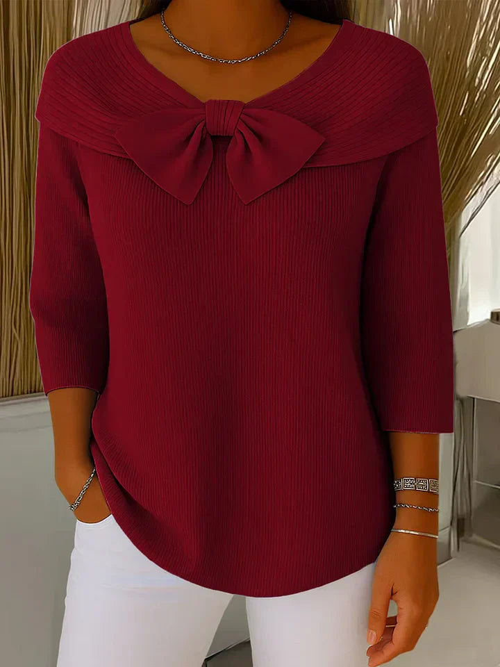 Elegant sweater featuring a romantic bow detail, crafted from soft fabric for a versatile and stylish look, perfect for any occasion. 3