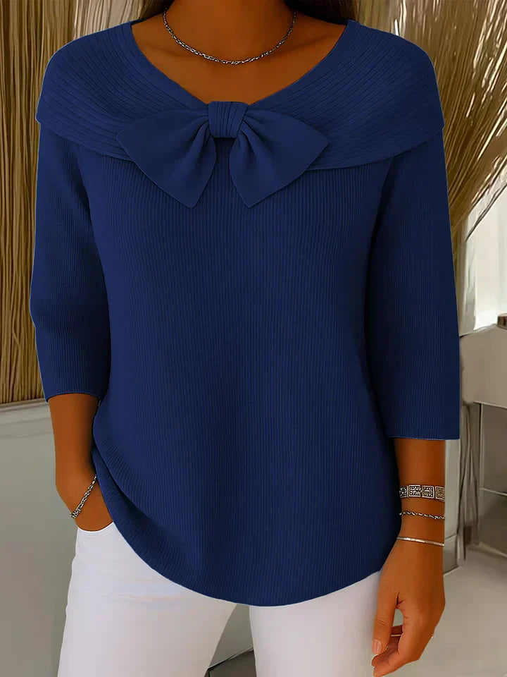 Elegant sweater featuring a romantic bow detail, crafted from soft fabric for a versatile and stylish look, perfect for any occasion. 4