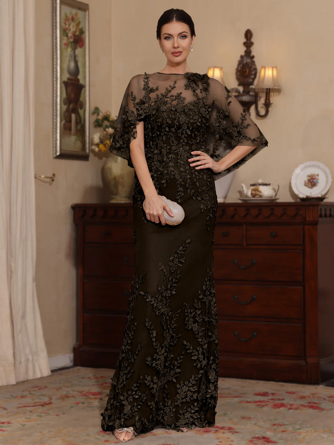 Elegant pearl pink floor-length lace mother of the bride dress featuring intricate beaded details and a flattering sheath design. 12
