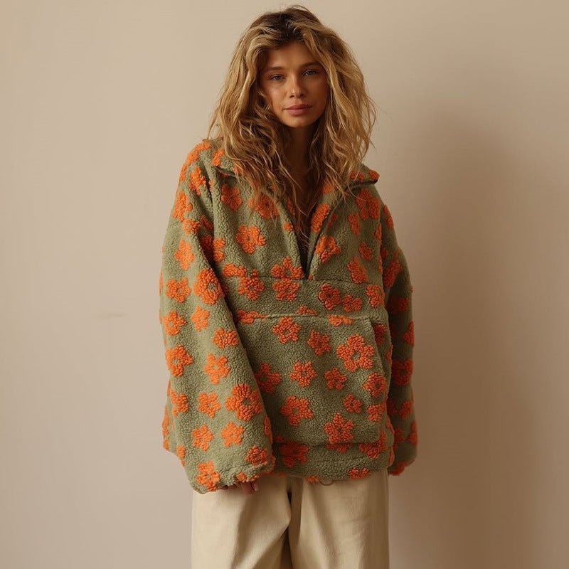 Floral teddy fleece jacket featuring an oversized retro daisy print and half zip closure, made from cozy sherpa fabric for ultimate comfort and style. 6