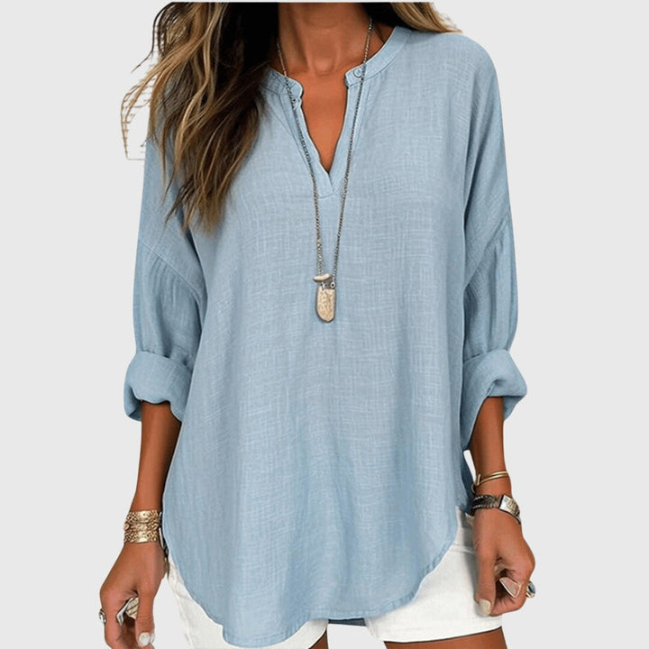 Flowy beach shirt featuring an elegant design and relaxed fit, perfect for summer outings; made from breathable fabric for ultimate comfort. 0
