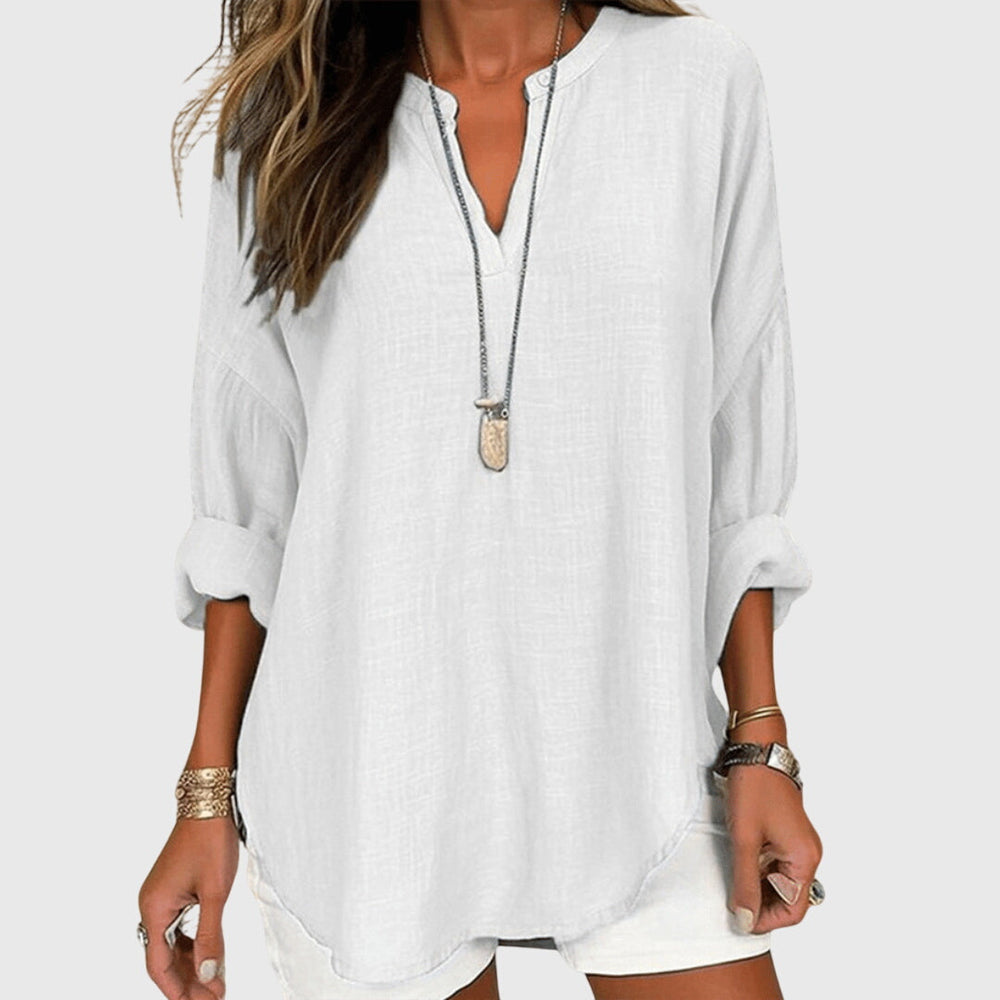 Flowy beach shirt featuring an elegant design and relaxed fit, perfect for summer outings; made from breathable fabric for ultimate comfort. 1