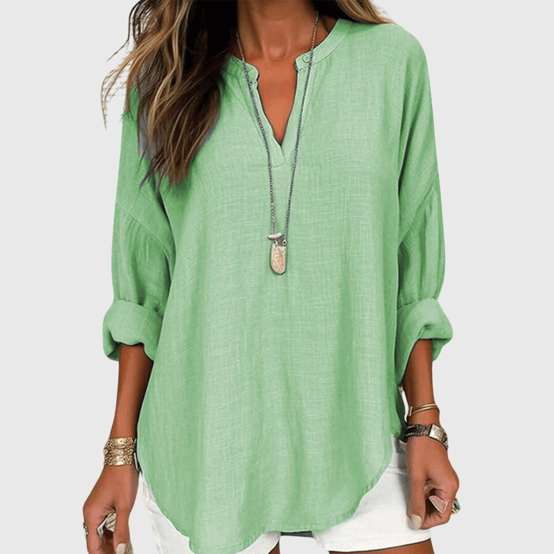 Flowy beach shirt featuring an elegant design and relaxed fit, perfect for summer outings; made from breathable fabric for ultimate comfort. 2