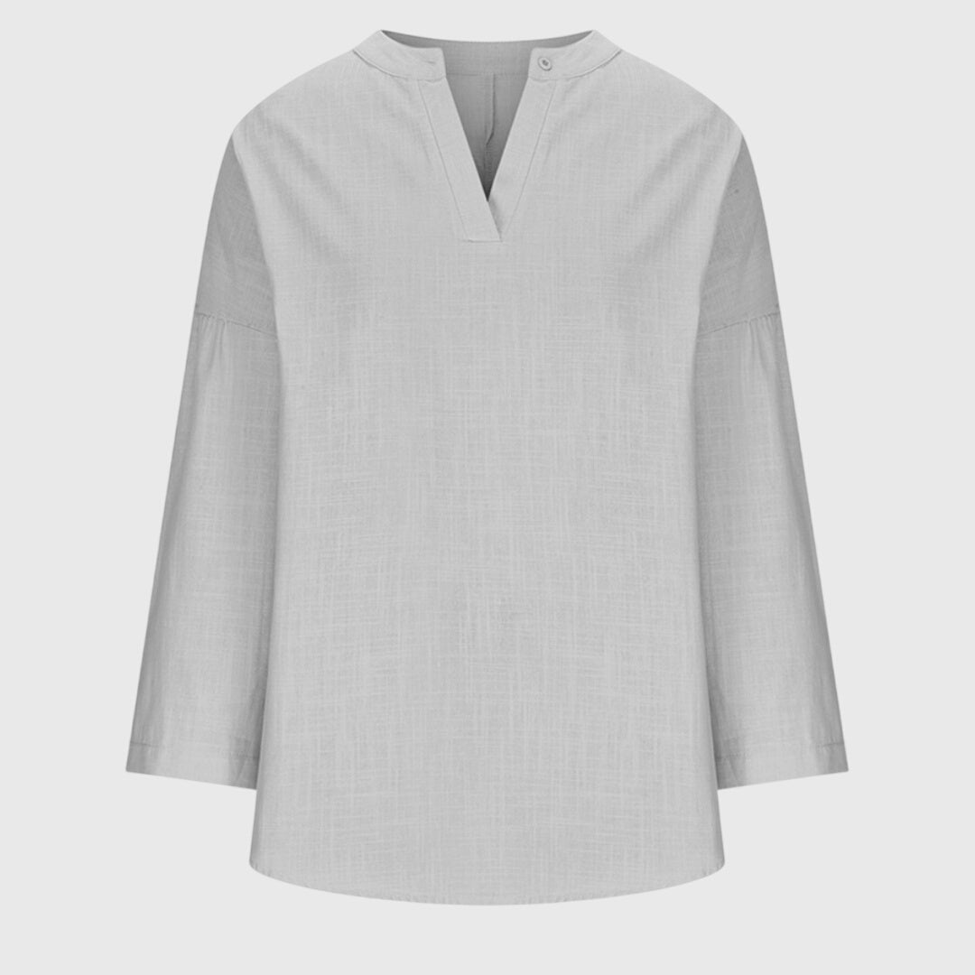 Flowy beach shirt featuring an elegant design and relaxed fit, perfect for summer outings; made from breathable fabric for ultimate comfort. 6
