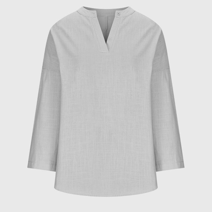 Flowy beach shirt featuring an elegant design and relaxed fit, perfect for summer outings; made from breathable fabric for ultimate comfort. 6