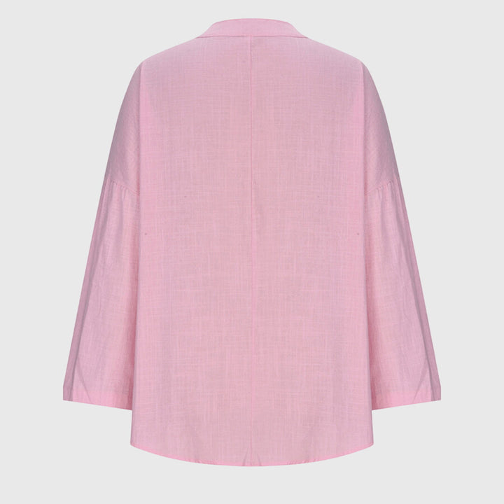 Flowy beach shirt featuring an elegant design and relaxed fit, perfect for summer outings; made from breathable fabric for ultimate comfort. 7