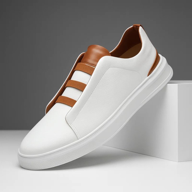 Men's genuine leather sneakers featuring an elastic strap system, designed for slip-on convenience and everyday comfort, perfect for casual wear. 0