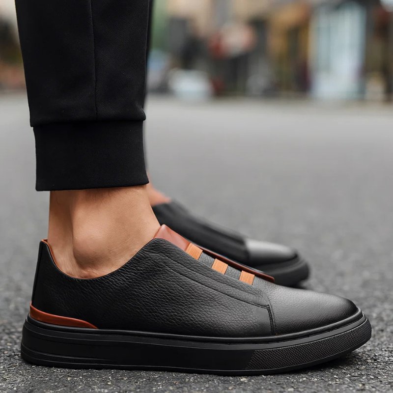 Men's genuine leather sneakers featuring an elastic strap system, designed for slip-on convenience and everyday comfort, perfect for casual wear. 3