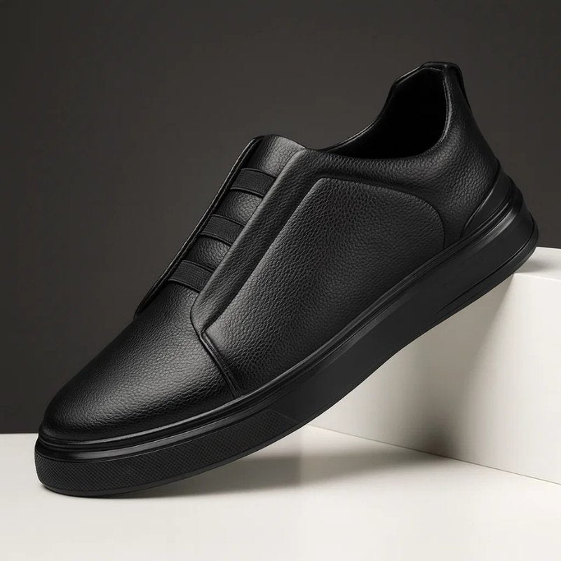 Men's genuine leather sneakers featuring an elastic strap system, designed for slip-on convenience and everyday comfort, perfect for casual wear. 4