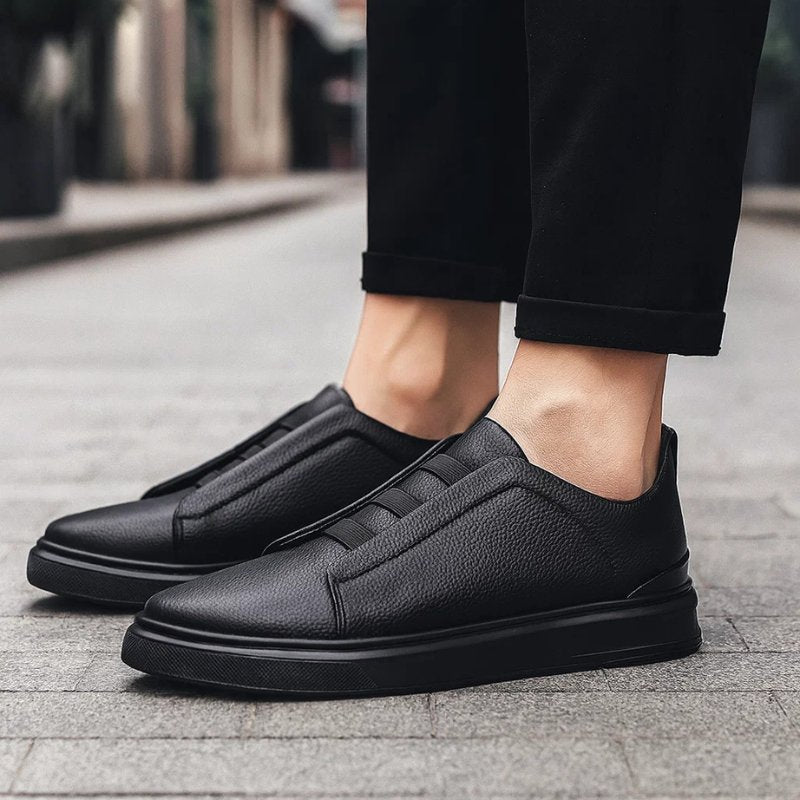 Men's genuine leather sneakers featuring an elastic strap system, designed for slip-on convenience and everyday comfort, perfect for casual wear. 5
