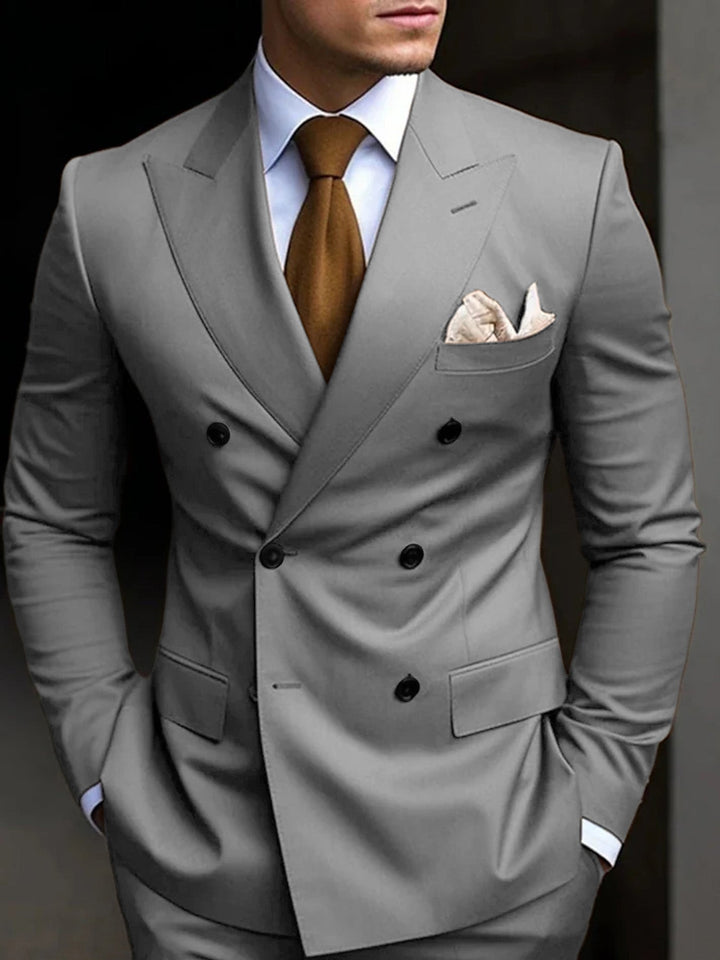 Men's black tailored fit suit featuring a double-breasted six-button closure, crafted from a comfortable cotton blend, presented as a two-piece set. 6