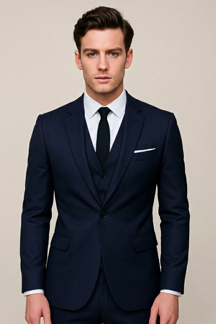 Men's slim fit formal wedding suit featuring a tailored blazer, waistcoat, and trousers, ideal for groomsmen. 0