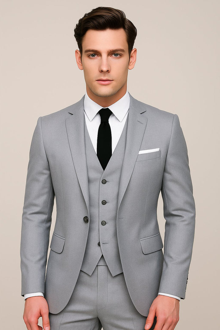 Men's slim fit formal wedding suit featuring a tailored blazer, waistcoat, and trousers, ideal for groomsmen. 2