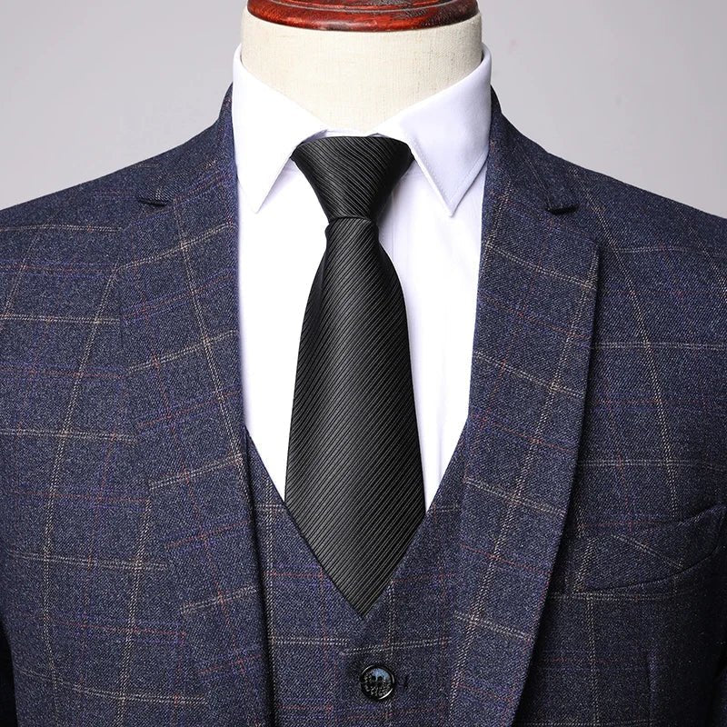 Men's three-piece suit featuring a stylish windowpane check pattern, designed for weddings and formal events, crafted from high-quality fabric for a tailored fit. 3