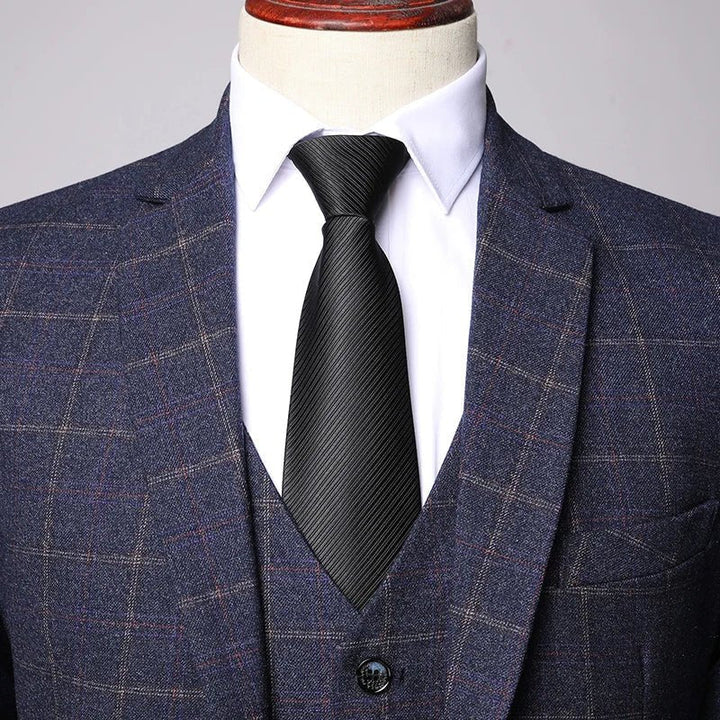 Men's three-piece suit featuring a stylish windowpane check pattern, designed for weddings and formal events, crafted from high-quality fabric for a tailored fit. 3
