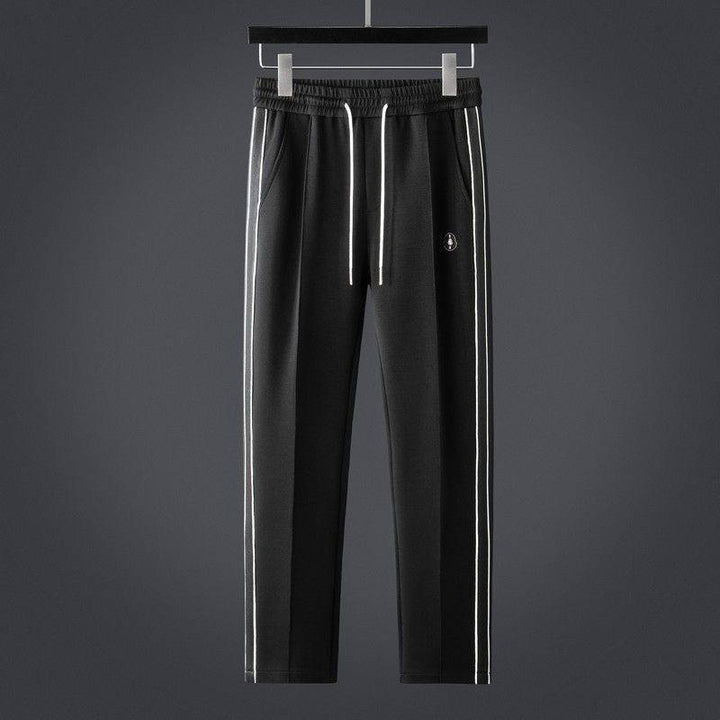 Men's tracksuit set featuring a zip-up jacket and athletic pants made from ultra-soft Lycra fabric, designed with a sporty stripe pattern for optimal comfort 3