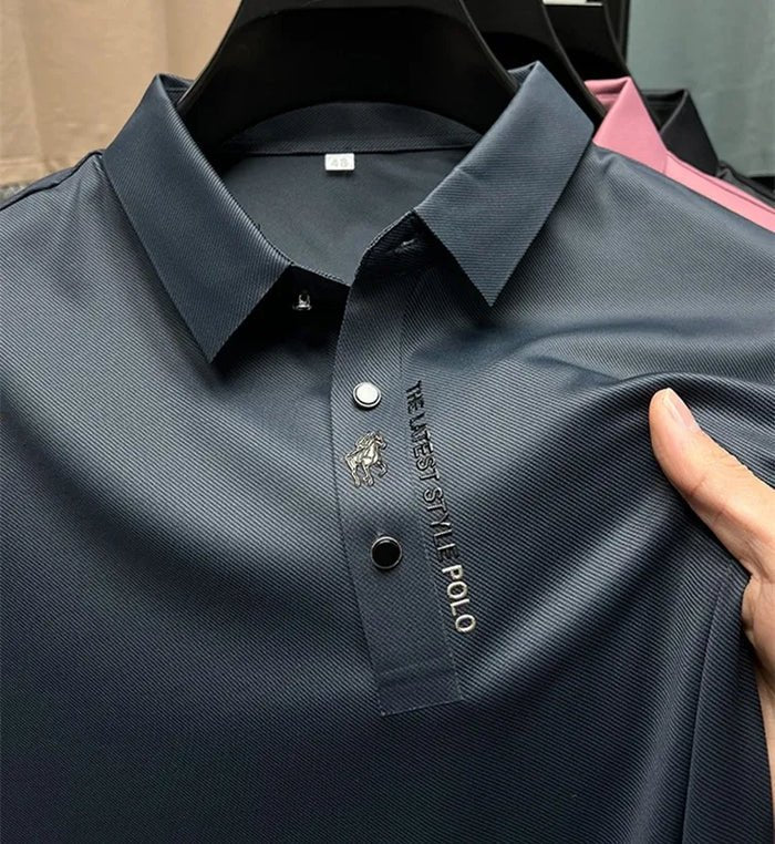 Men's wrinkle-free polo shirt made of stretch cotton, featuring a classic short sleeve design in various colors, perfect for casual or business casual wear. 0
