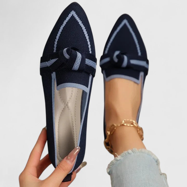 Orthopedic loafers for women featuring superior arch support and shock-absorbing cushioning in a sleek black slip-on design. 4